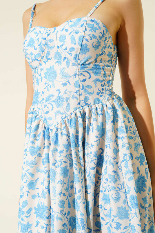 Robe midi à bretelles à motif floral bleue