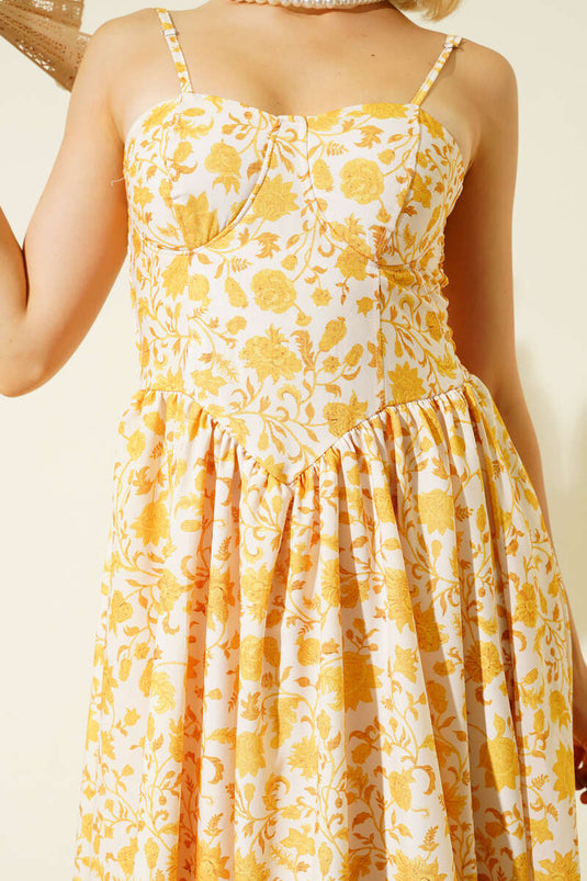 فستان ميدي أصفر اللون بنقشة زهور وحمالات رفيعة