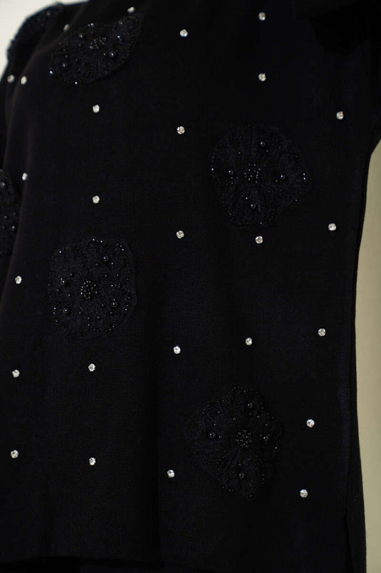 طقم تريكو من قطعتين بنقشة زهور باللون الأسود