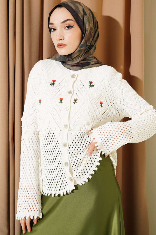 Cardigan corto in maglia bianca con bottoni e ricamo floreale