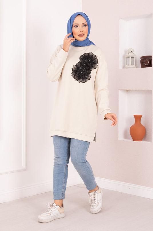 Tunique hijab Oysho beige brodée de fleurs