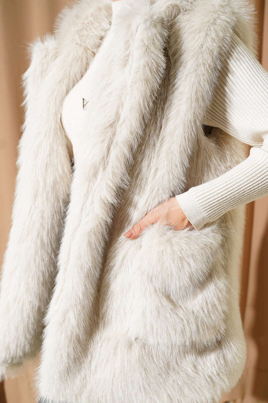 Gilet en fourrure avec détails à double poche