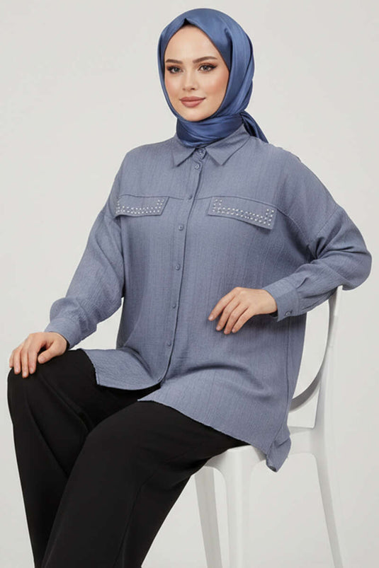 تونيك رمادي بجيوب مزدوجة وأزرار معدنية
