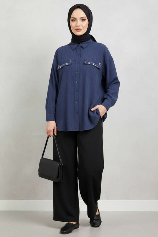 تونيك بجيوب مزدوجة وأزرار معدنية باللون الأزرق الداكن