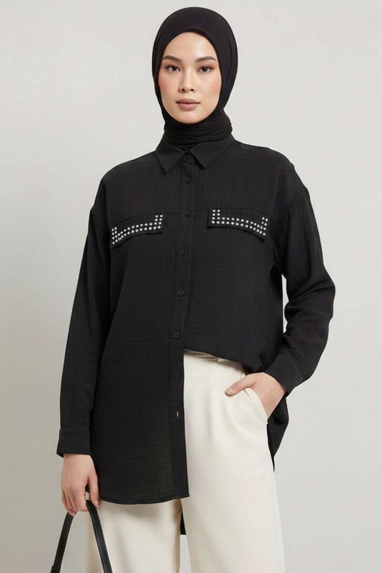 تونيك أسود بجيوب مزدوجة وأزرار معدنية