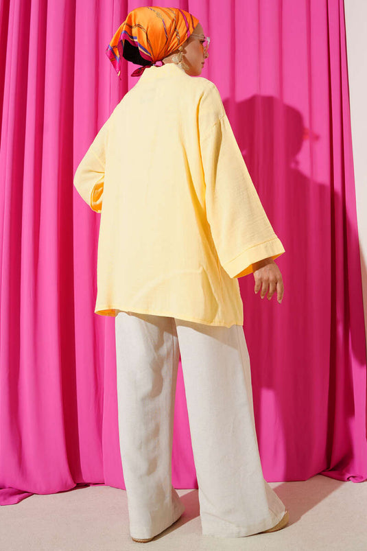 كارديجان موسلين مزدوج الجيب باللون الأصفر