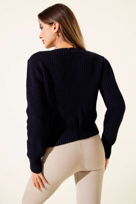 Cárdigan corto con dos bolsillos y patrón de punto acanalado, azul marino