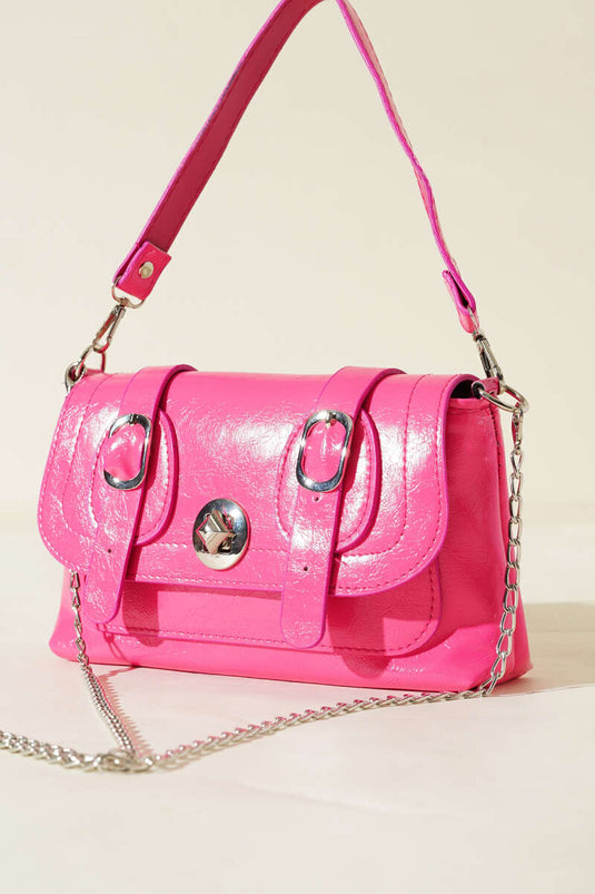 Sac fuchsia en cuir verni à double ceinture