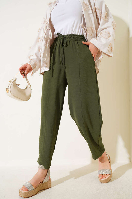 Pantalones con cinturón Chimali color caqui