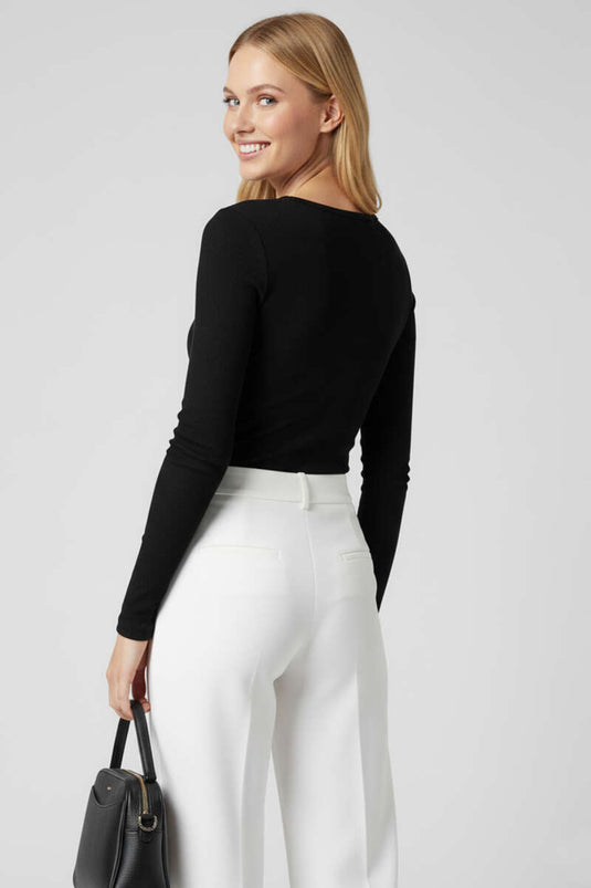 Chemisier noir à boutons-pression