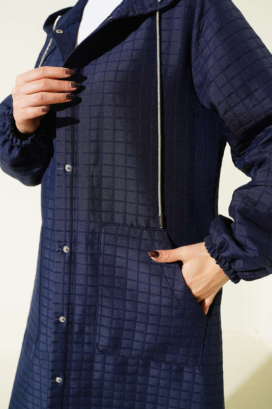 Manteau matelassé à capuche et boutons-pression bleu marine