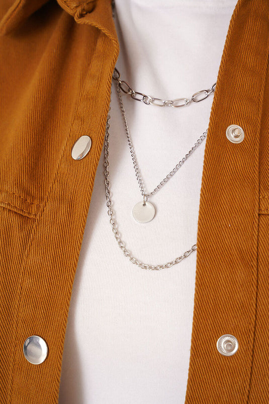 سترة الدنيم ذات الأزرار المفاجئة التبغ