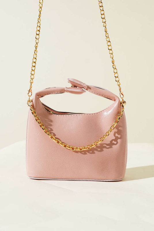 حقيبة جلدية لامعة بمقبض كبس وحزام سلسلة ومسحوق