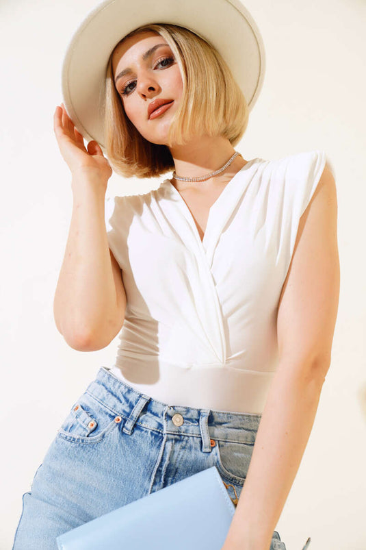 Sleeveless Snap-On Bodysuit in Ecru