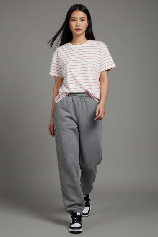 قميص واسع بتفاصيل خطوط وردي