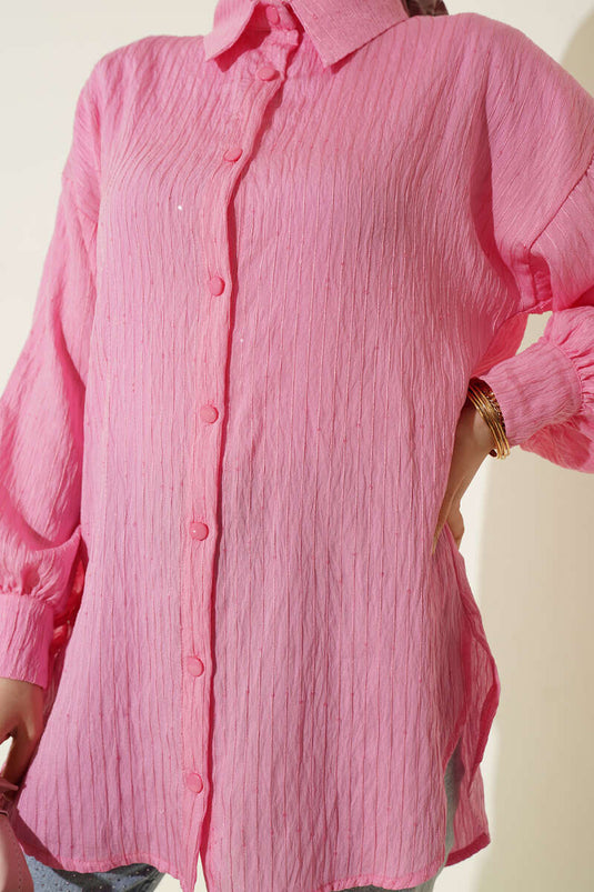 Chemise rose avec détails paillettes et coutures en ligne
