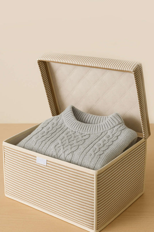 حقيبة تخزين صغيرة بغطاء مخطط باللون الكريمي