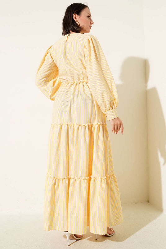 Gestreepte gelaagde jurk geel