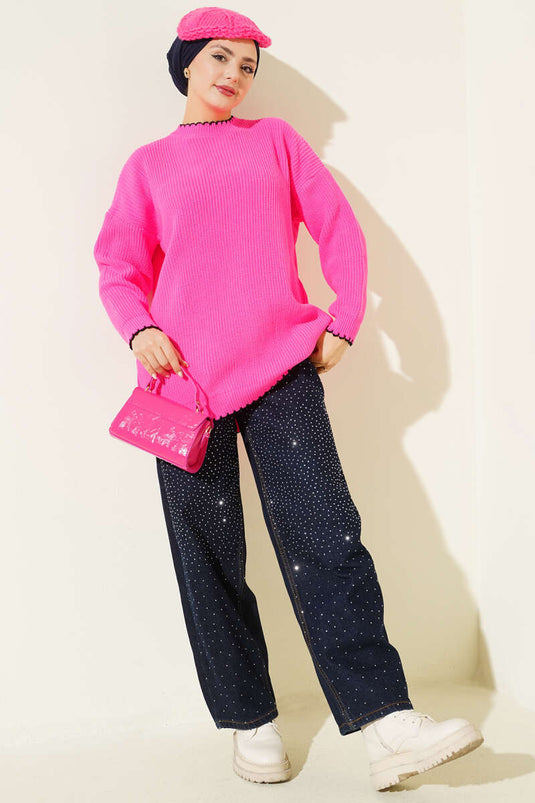 تونيك تريكو بتفاصيل درزة الراعي باللون الوردي