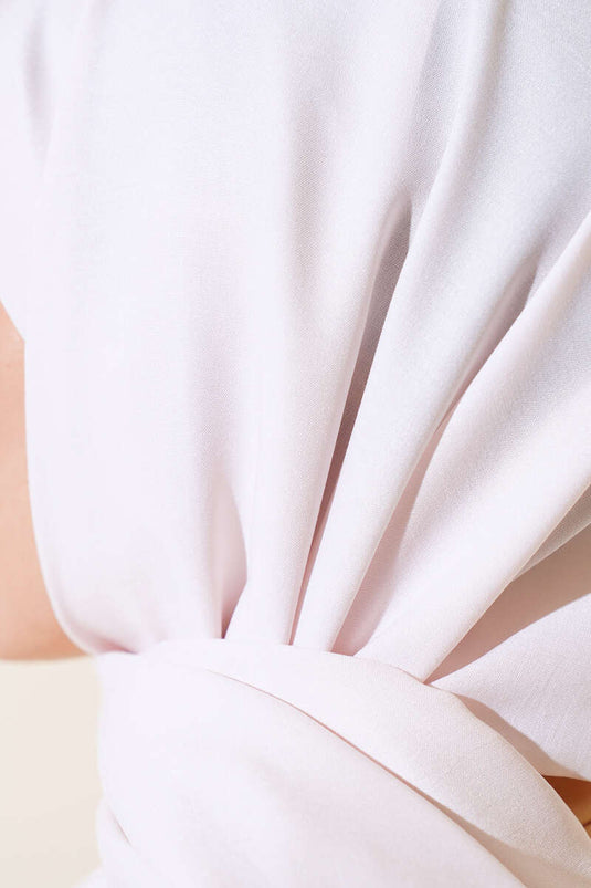 شال من القماش القطني باللون البيج الرملي