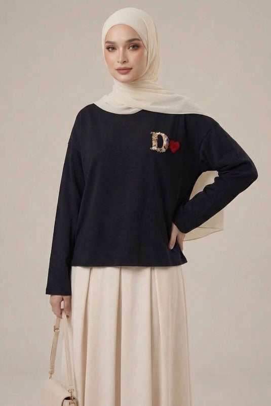 Tunique noire avec logo D et motif cœur