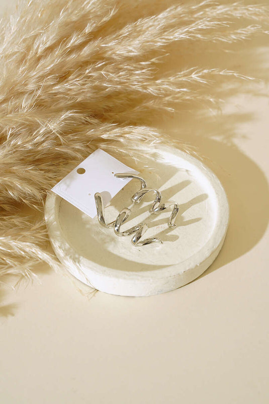 أقراط فضة على شكل موجة