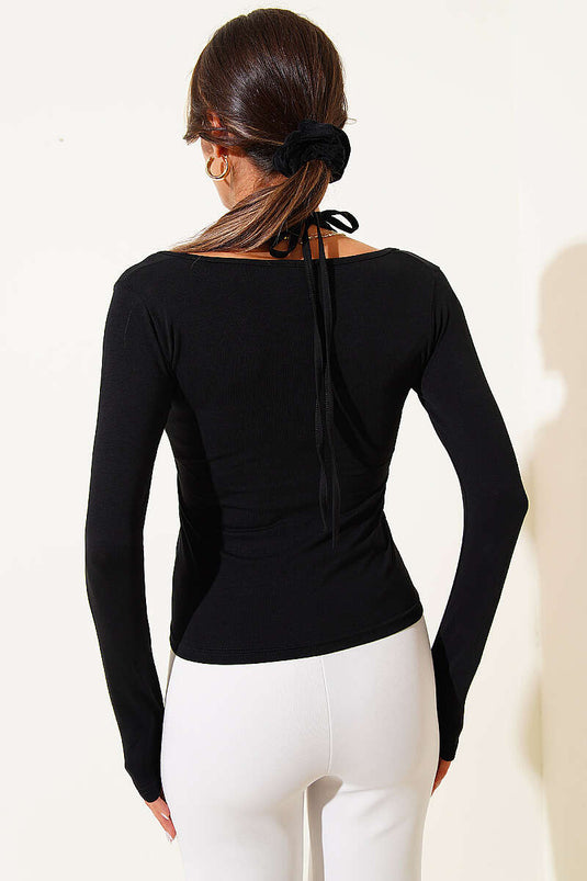 Blusa con detalle de lazo de encaje negra