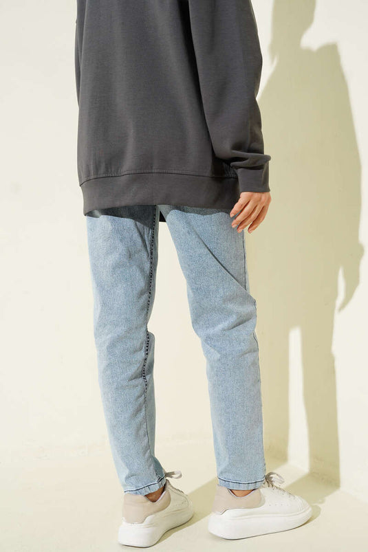 بنطال جينز بجيب جانبي وخصر مطاطي لون أزرق فاتح