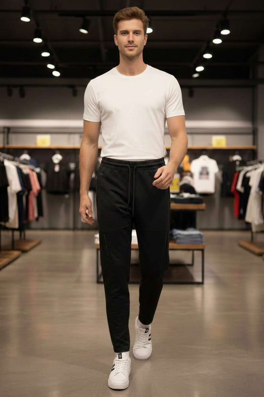 Bas de survêtement homme noir avec poches à fermeture éclair Dar Paça