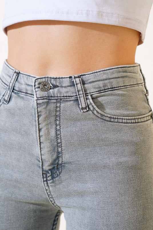 نحيل الجينز الرمادي الثلجي