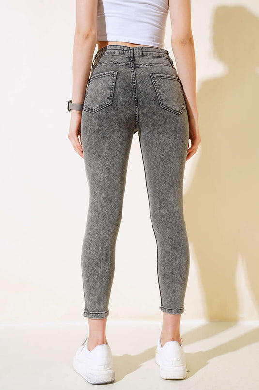 بنطال جينز سكيني أسود ثلجي