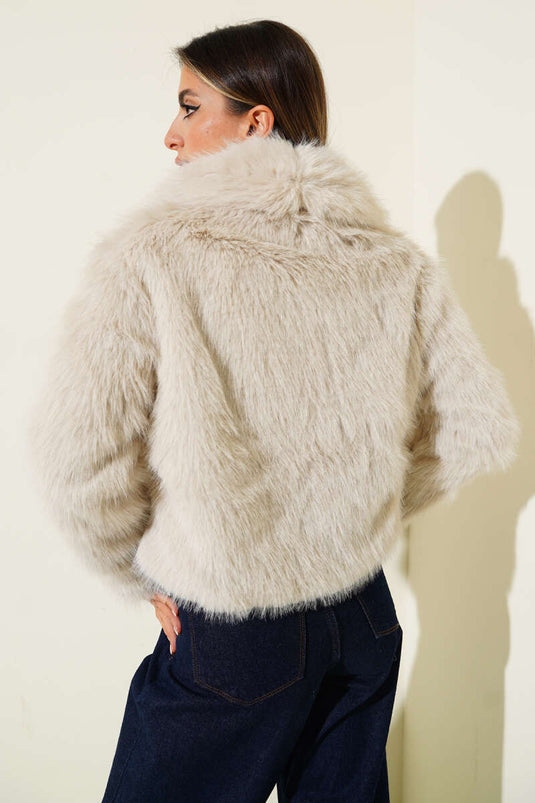 معطف فرو مزين بفيونكة جلدية