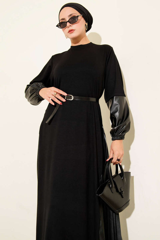 فستان أسود مزين بالجلد وحزام