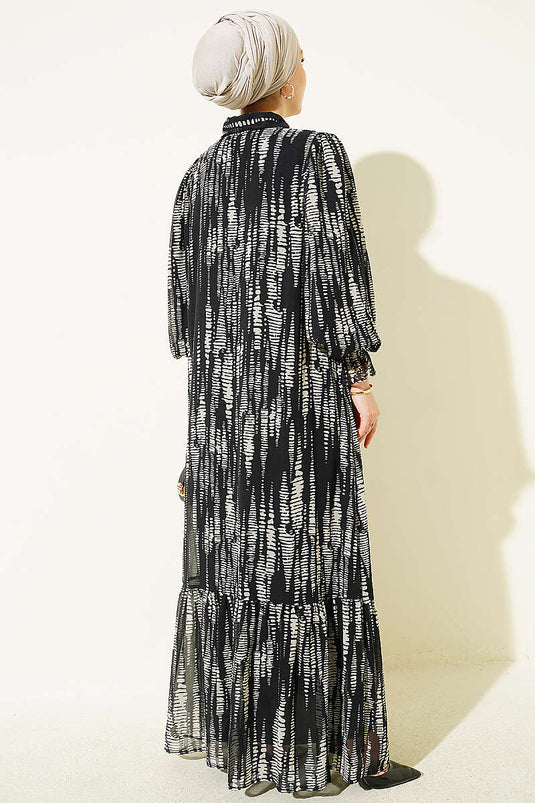 Gemustertes Schwarzes Kleid Mit Elastischen Bündchen