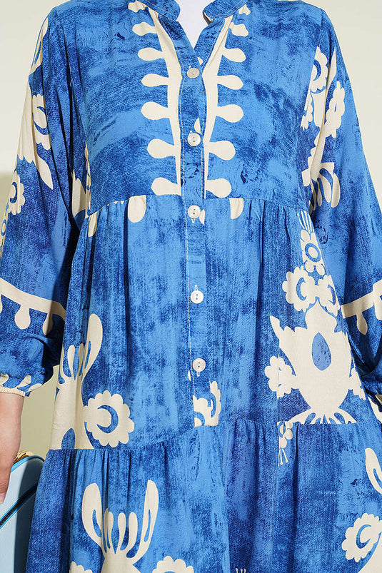 Robe à motifs avec boutons et poignets élastiqués bleue