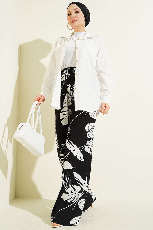Pantalon à jambes larges élastiqué à motif noir à motifs