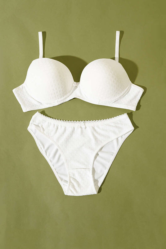 طقم حمالة صدر غير مبطنة من الجاكار المزخرف باللون البيج