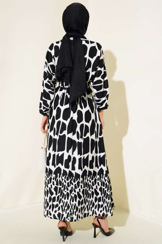 Robe noire à motifs et ceinture