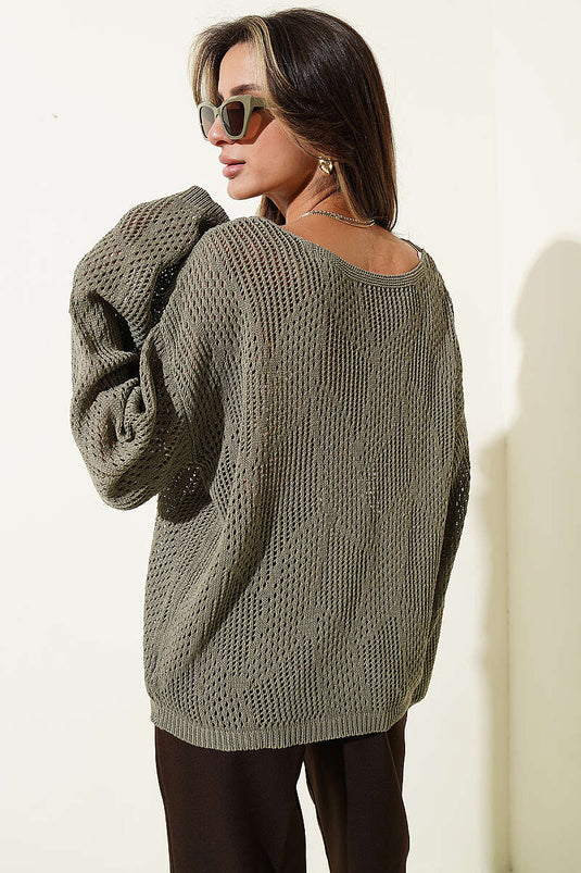Maglione oversize traforato a rete color verde oliva