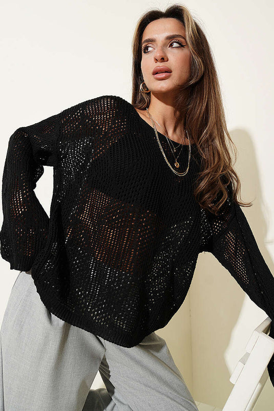 Maglione oversize traforato a maglia nera con motivo