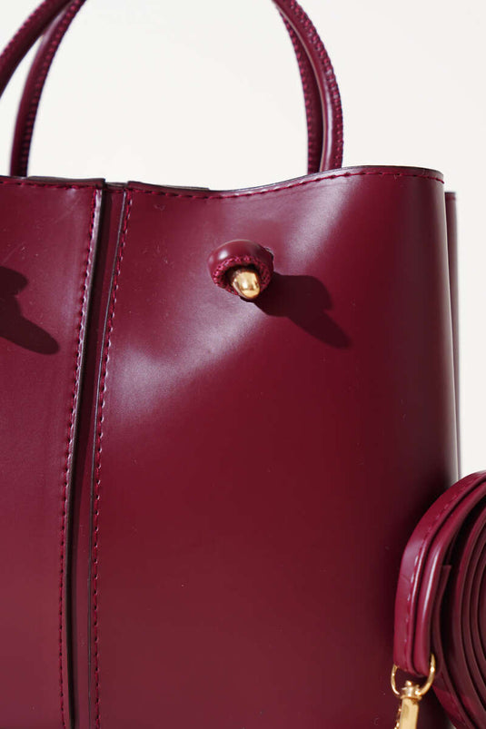 Damenhandtasche mit Ziernähten, Burgunderrot