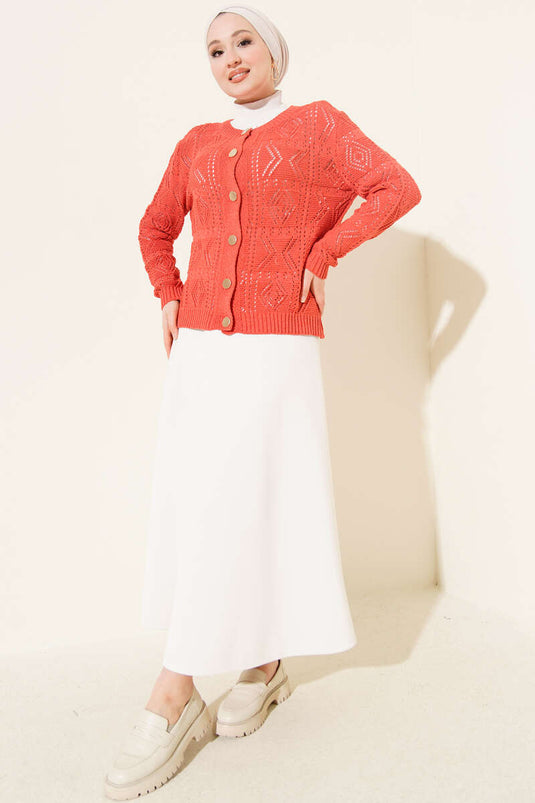 Kort gebreid vest met knopen en ajourpatroon, koraalrood