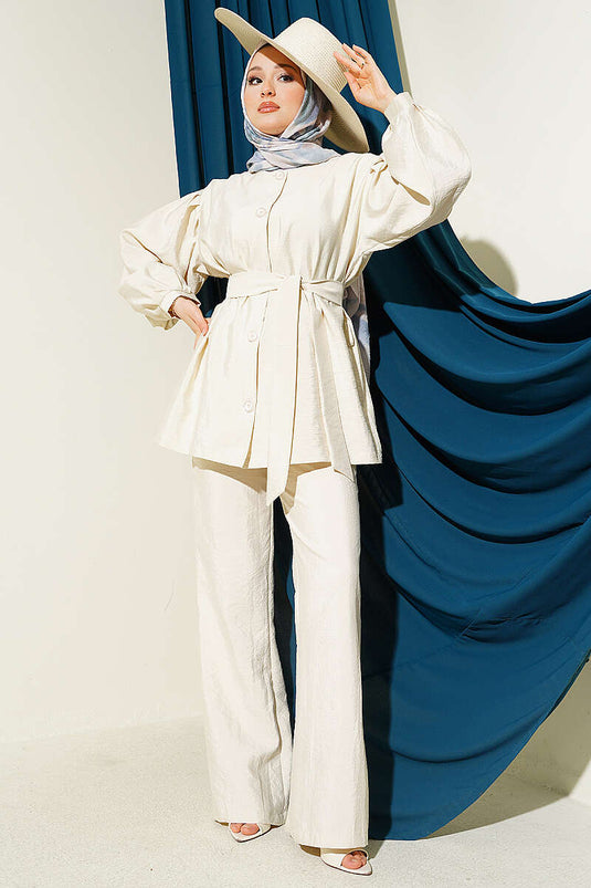 Ensemble deux pièces beige avec manches ballon boutonnées en tissu parachute
