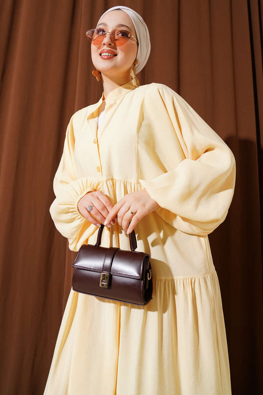 فستان بأزرار وأساور مطاطية، أصفر