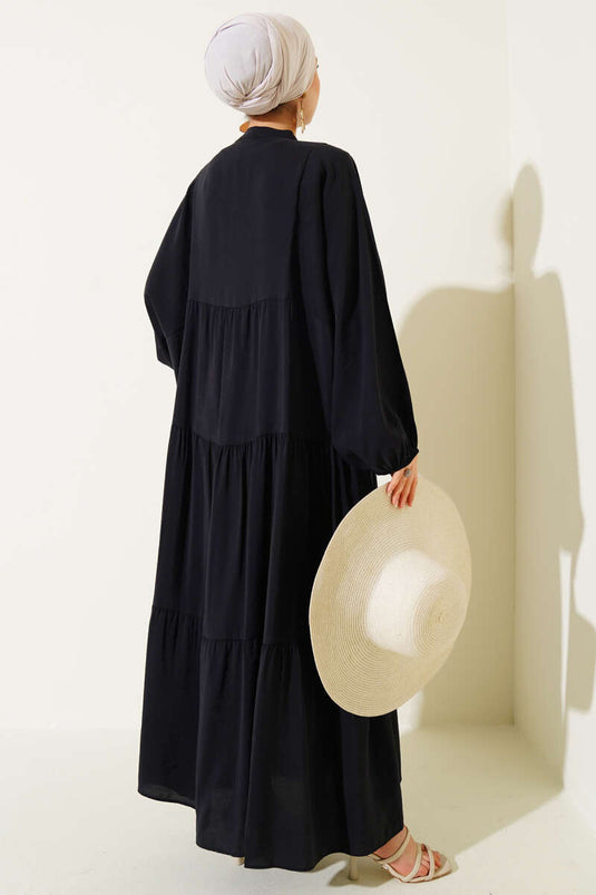 Robe boutonnée à poignets élastiqués, noire