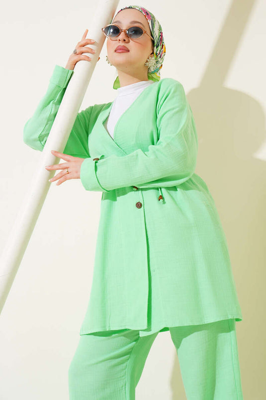 طقم من قطعتين من الموسلين بأزرار ورباط، لون أخضر مائي