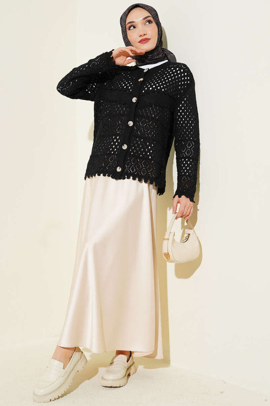 Cardigan court en tricot noir à boutons et reliefs