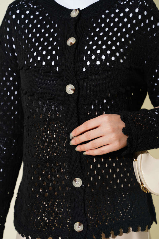 Cardigan court en tricot noir à boutons et reliefs