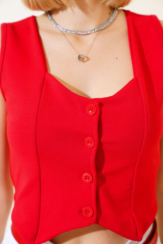 سترة مزدوجة الصدر بأزرار باللون الأحمر