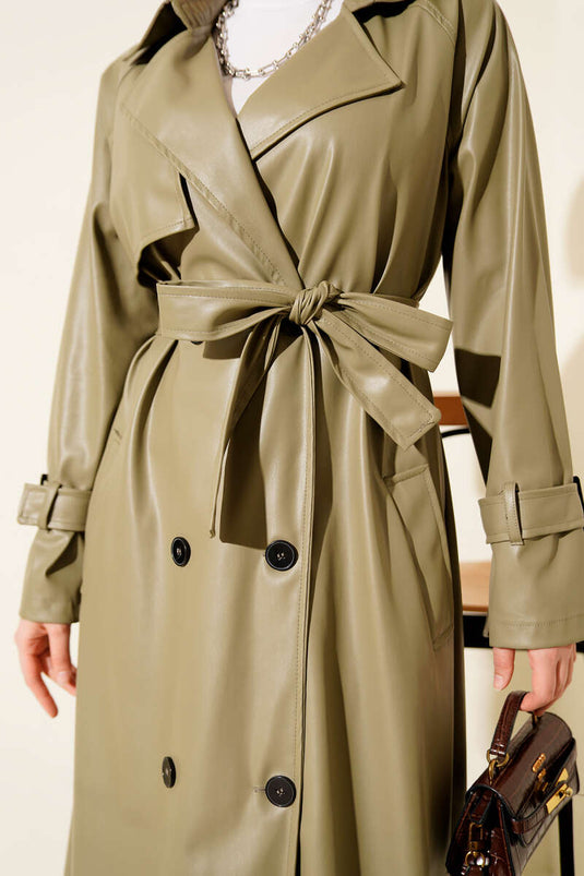 Trench-coat en cuir vert amande, boutonné et ceinturé
